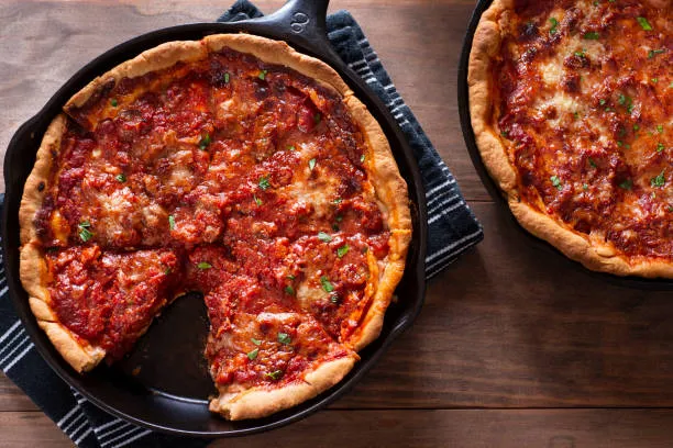 5 Styles of Chicago Pizza Chicago pizza is more than just a meal. When you visit Chicago, you will be able to get the scoop on five different Chicago pizza styles. We have a good reputation in the city. We love our pizzas with a casserole look. Chicago pizza is a varied landscape of different shapes and sizes and that doesn't include the famous Pizza Puff which is a food group all of its own. There are five main pizza styles in Chicago. 1- Deep Dish Pizza When people hear Chicago-style pizza, they think of a deep dish. The sauce is on the top. Sausage is on it, in Chicago style. There is a debate over where and when deep dish pizza was invented. Depending on whom you ask, it may have been invented at Pizzeria Uno in 1943 by either of the two men mentioned. They wanted to create a pizza that would make Italians feel at home but with a distinctly American twist. History was created once they inverted the layers. Earlier ownership has been claimed by other pizzerias. Chicago deep dish pizza appeared in many versions over time, eventually evolving into the style that is now popular all over America. 2- Stuffed Pizza You are already a Chicago-style pizza star if you called me out for including Giordano’s. Traditional deep dish pizza pies are not being served at Giordano's. There is a difference between a deep dish and a stuffed pizza, the deep dish has cheese, sauce, and a layer of crust, while the stuffed pizza has cheese, sauce, and a layer of crust. stuffed pizza is usually deeper than a deep dish pizza and has more cheese. Nancy's and Giordano's opened in 1974, the year that this pizza style burst onto the scene. The creation of stuffed pizza is a mystery since the two pizzerias have the same origin stories. Both companies claim to have been inspired by scarciedda, a type of Easter pie. The pie's true origins may be in southern Italian cities like Naples but, like many foods, its roots are unknown. 3- Pan Pizza Pan style pizza is basically just a pizza made in a deep pan and doesn't have a lot of sauce on top. The rest of the pizza is arranged in a way that makes it easier to eat. pan pizza's history is not clear. Some say it was invented by the Giordano family in Chicago, others say it was invented by the Dan and Frank Carney in Kansas, and still others say it was invented by them. Pequod's is the best pan pizza in Chicago because the sauce on top stops the cheese from burning. The pizzeria lines each baking pan with cheese before building their pizzas. 4- Tavern Pizza I would like to introduce you to the tavern style of pizza, which is also known as party style. This pizza has a hallmark? It is thin, cut into squares. The tavern style pies were popular in Chicago during the 1920's. It was used to get people to buy booze. Most taverns don't have plates or napkins, so owners cut pizzas into squares so they fit. It's the perfect party pizza, you can get it in huge sizes, and everyone gets to pick their own pizza. Sausage is the typical Chicago topping, but tavern pies are very versatile so you can go wild. 5- Pizza Pot Pie The only place in Chicago that sells pizza pot pie is the Chicago Pizza and Oven grinder Company. Albert H. is a human. The pizza pot pie was invented in 1972 by the restaurant owner. The Lincoln Park location of the pizzeria is across the street from the site of the 1929 St., so this pizza style is well-known in the city. There was a massacre on Feb. 14th. Pizza pot pies are made upside-down. The dough is stretched over the top of the bowl of sauce and toppings. The whole thing gets baked. When it reaches your table, the server flips the bowl over onto a plate and releases the pizza, letting it flop down into a tasty mess.